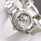 Omega wristwatch open caseback showing mechanical movement through glass