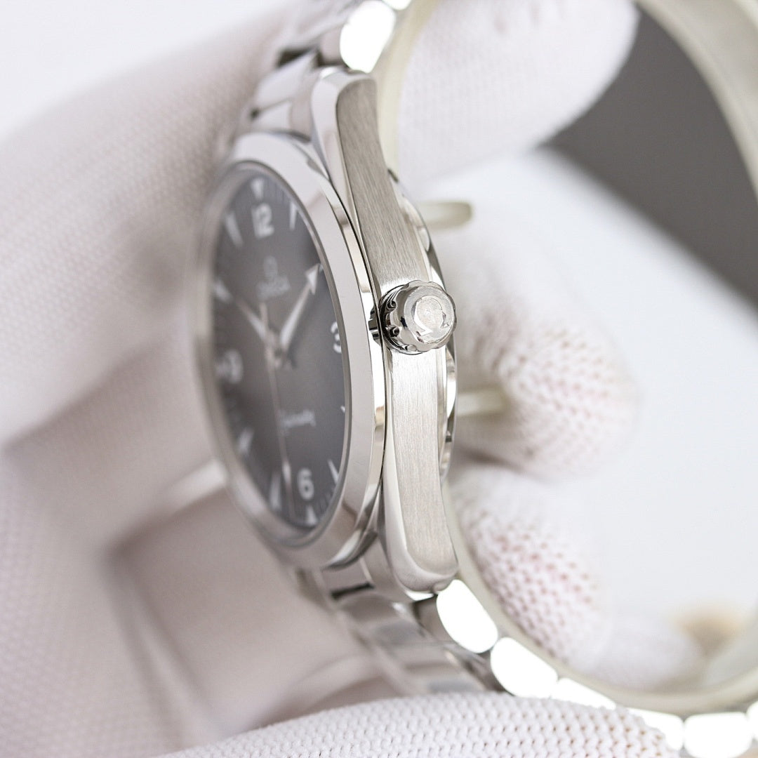 Omega wristwatch profile view with crown and stainless steel bracelet links