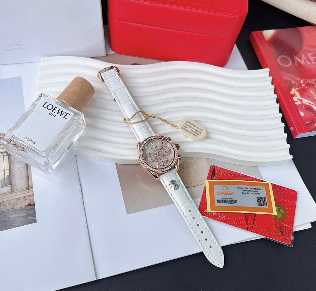 Omega watch with white leather strap and rose-gold case; silver dial with subdials