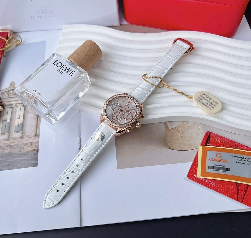 Omega watch with white leather strap, silver dial and rose-gold bezel