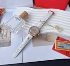 Omega watch with white leather strap, silver dial and rose-gold bezel