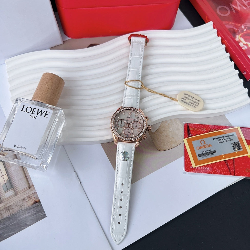Omega watch with white leather strap and rose-gold case; silver dial with multiple subdials
