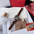 Chronograph watch on brown leather strap with silver case, black dial and three subdials