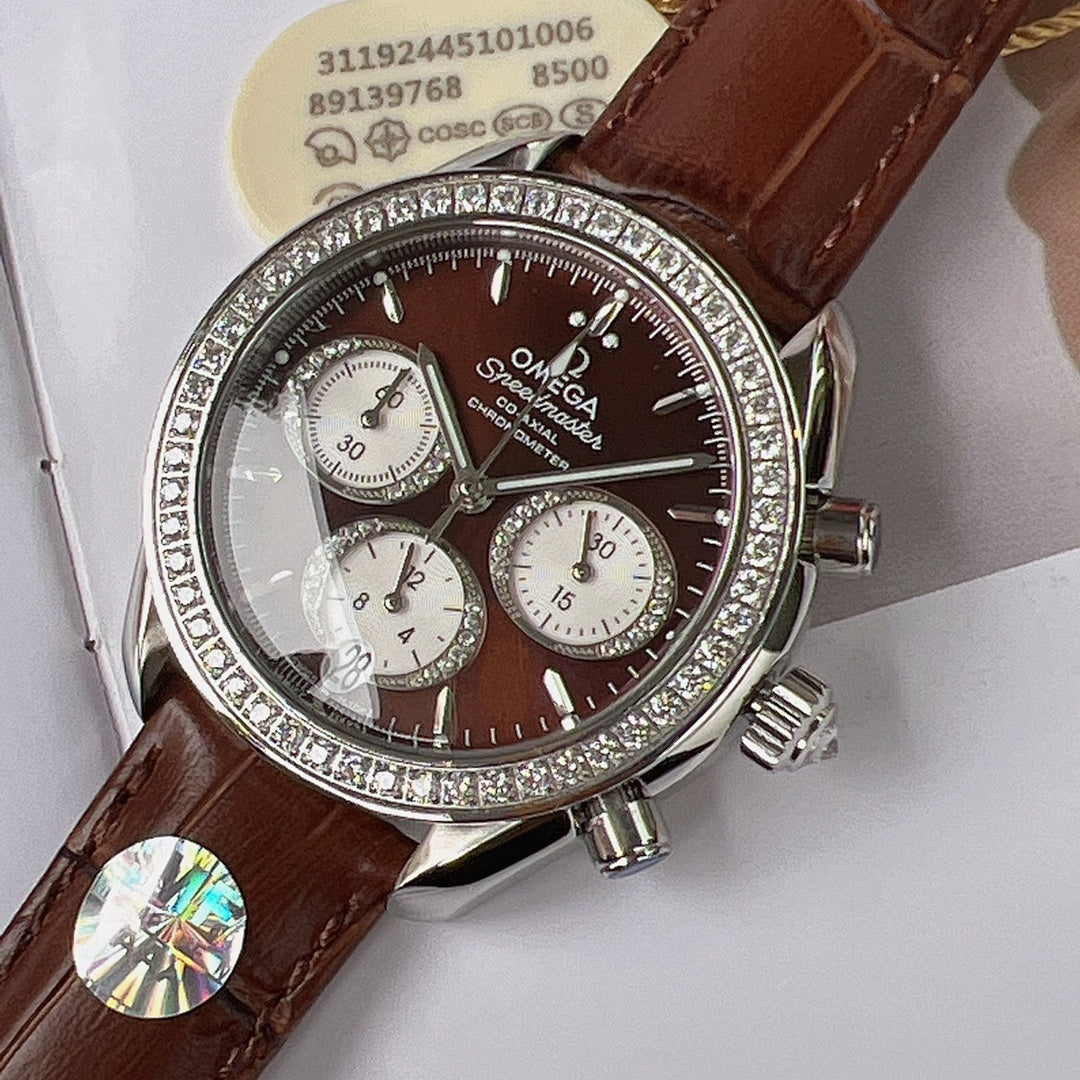 Jeweled bezel chronograph watch with brown leather strap, black dial and three subdials