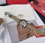Omega watch with tan leather strap, silver chronograph case and black dial subdials
