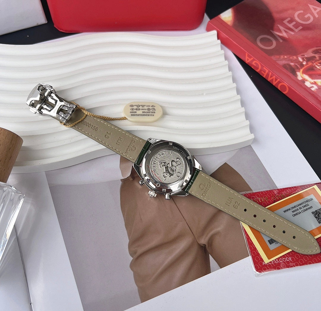 Omega watch with tan leather strap, silver chronograph case and black dial subdials