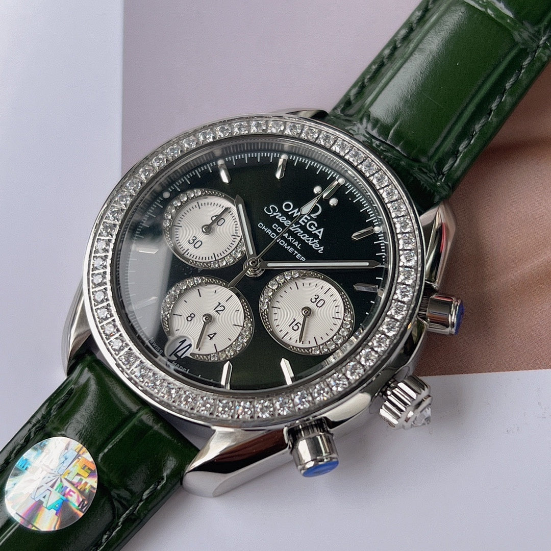 Omega watch with green leather strap, diamond bezel, black chronograph dial and subdials