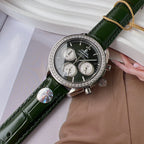 Omega watch with green leather strap, diamond bezel, black dial close-up with subdials