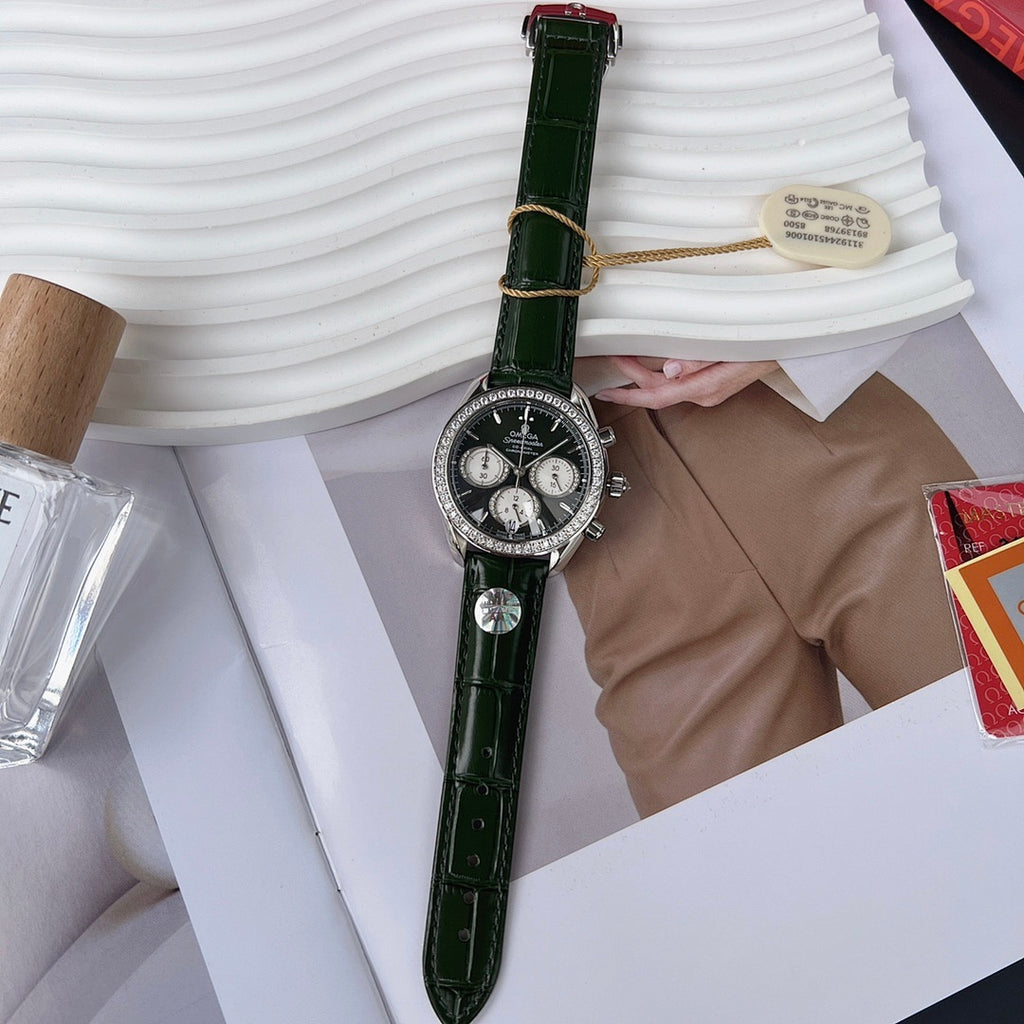 Omega watch with green leather strap, black chronograph dial, silver crown and subdials