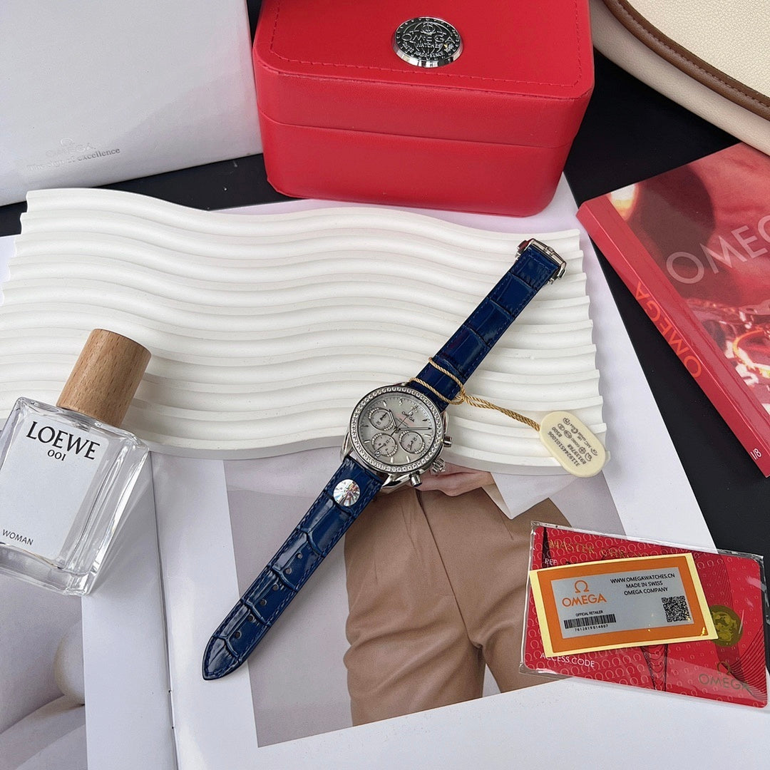 Omega wristwatch with blue leather strap and silver dial with three subdials