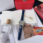 Omega wristwatch with blue leather strap, silver dial and diamond-studded bezel