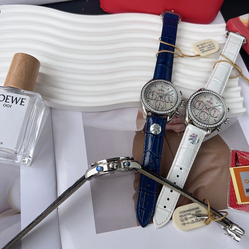 Omega wristwatch with blue leather strap and silver chronograph dial, diamond rim