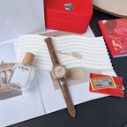 Brown leather chronograph watch with rose-gold case, crystal bezel and three subdials