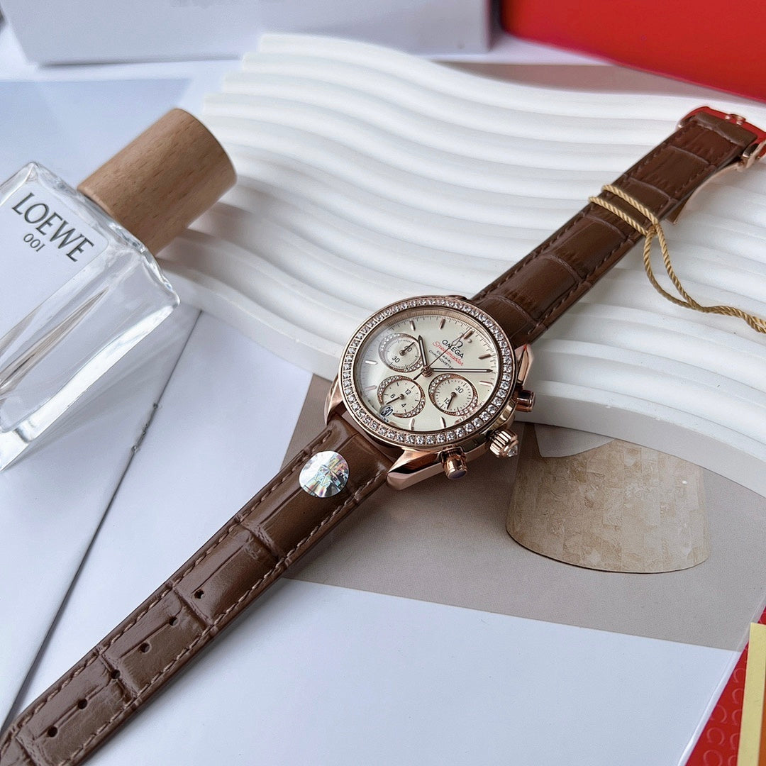 Brown leather chronograph watch with rose-gold case, crystal bezel and visible subdials