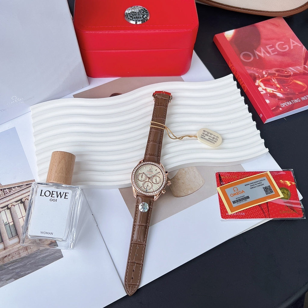 Brown leather chronograph watch with rose-gold case, crystal bezel and subdials