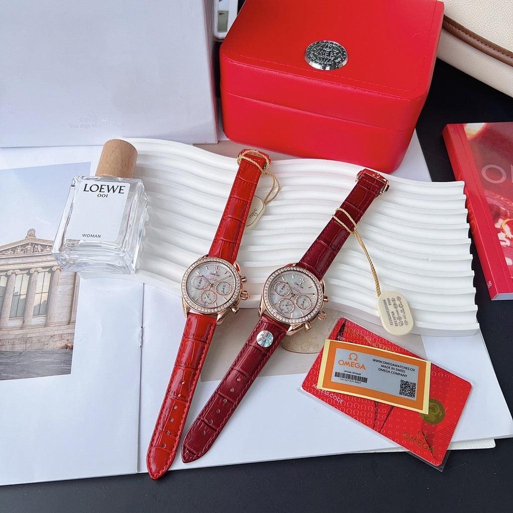 Pair of red leather strap wristwatches with rose-gold cases and white chronograph dials
