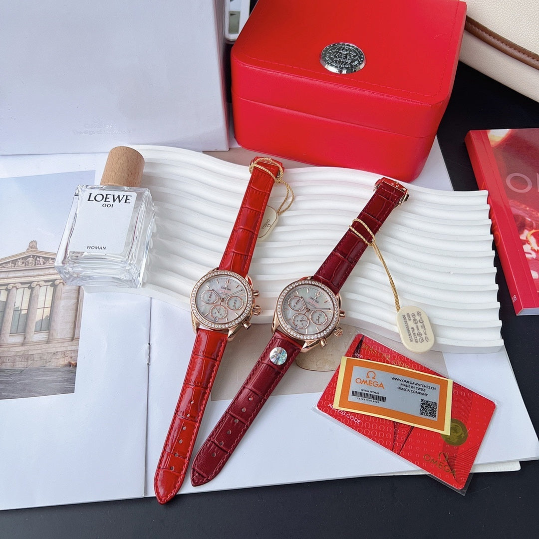 Pair of red leather strap wristwatches with rose-gold cases and white chronograph dials