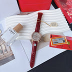 Red leather strap wristwatch with rose-gold case, white dial, and small subdials