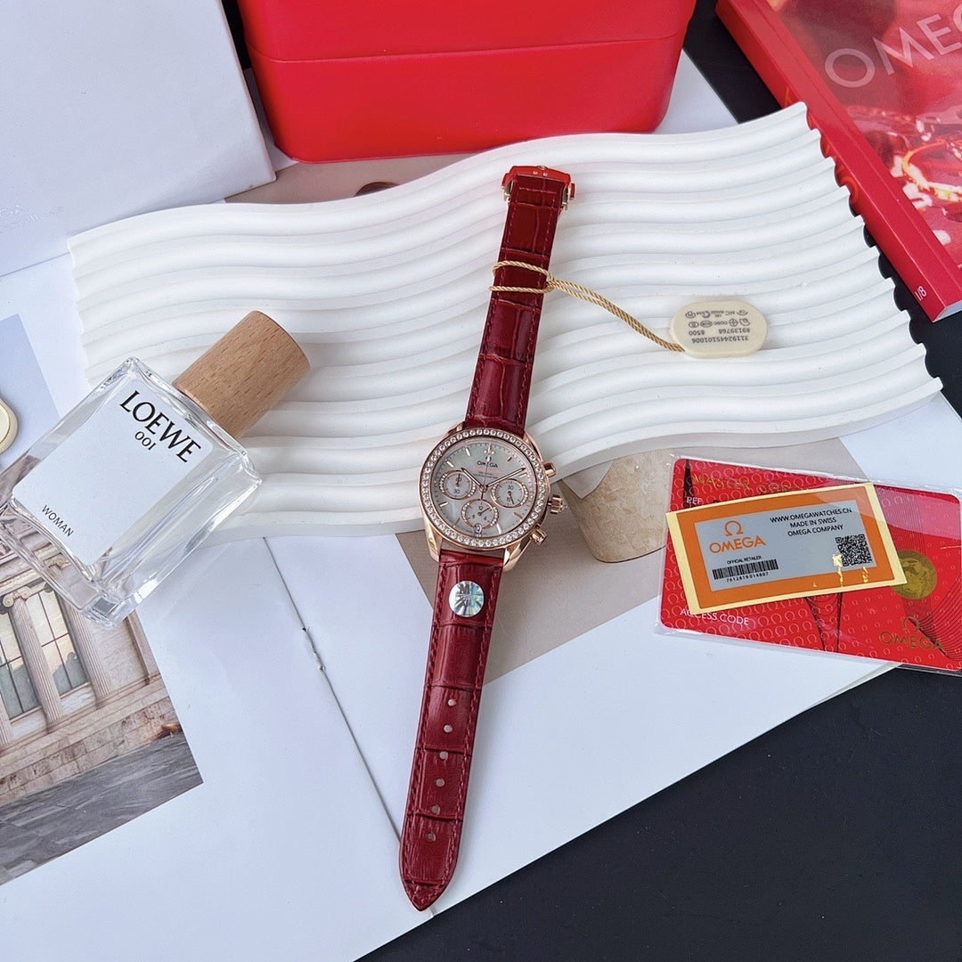 Red leather strap wristwatch with rose-gold case, white dial, and small subdials