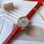 Wristwatch with red leather strap and rose-gold round case, diamond-look bezel, white chronograph dial