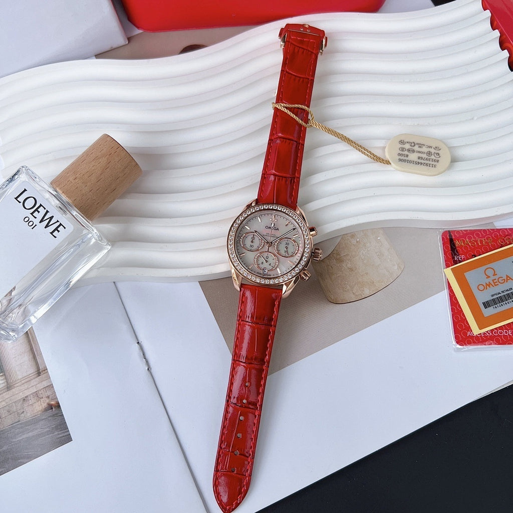 Red leather strap wristwatch with round silver case and subdial detail, analog dial