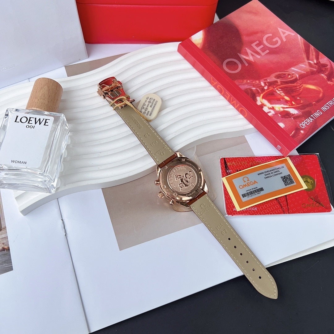 Omega wristwatch with rose gold case and diamond bezel, dark dial and gray leather strap