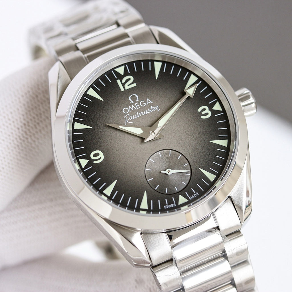 Omega wristwatch close-up, dark dial with numerals, silver bezel and watch hands.