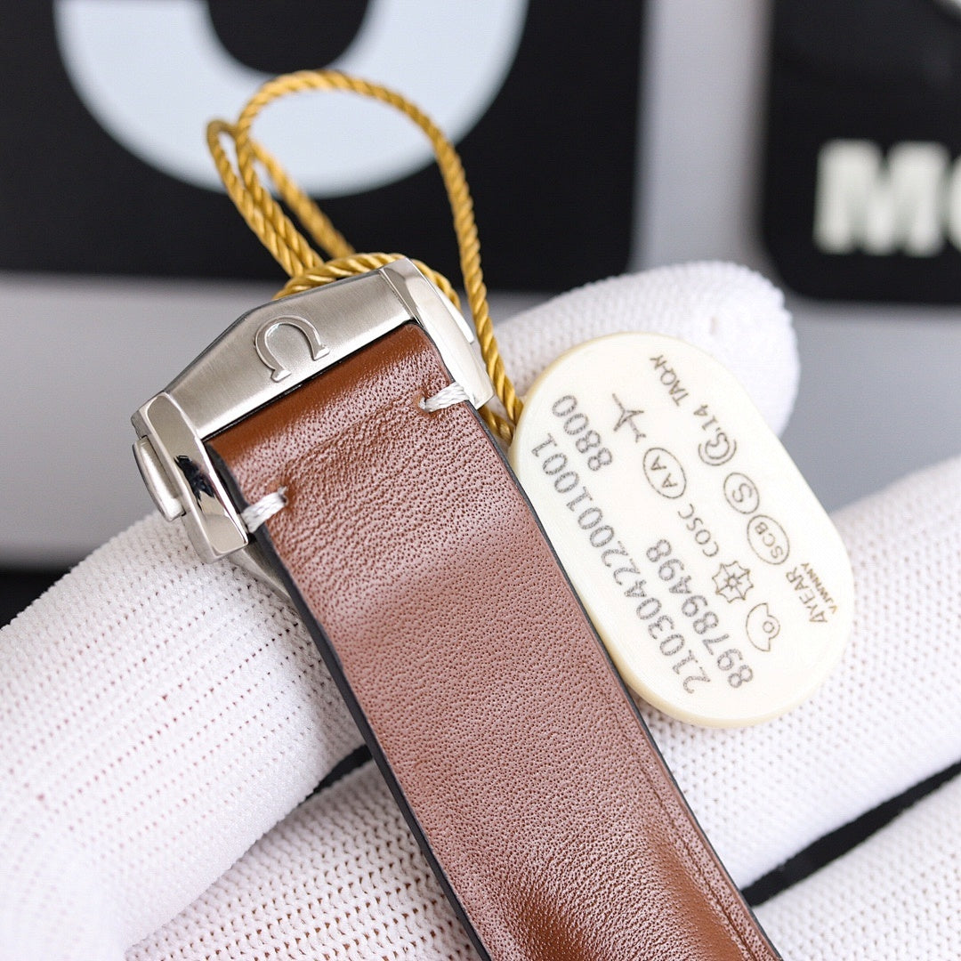 Omega watch with brown leather strap, metal buckle, side view of the case.