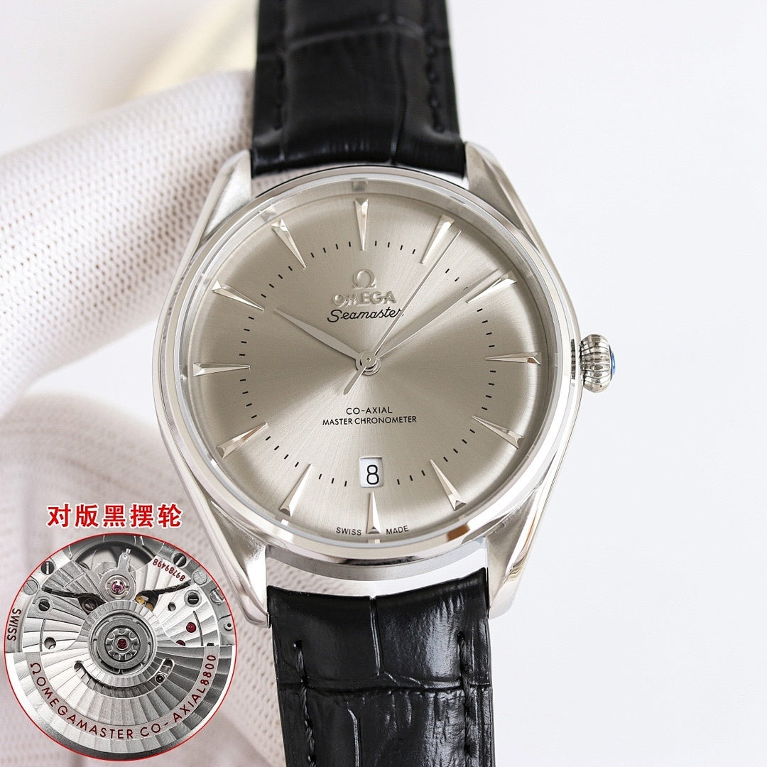 Omega Seamaster wristwatch with champagne dial, baton markers, and black leather strap