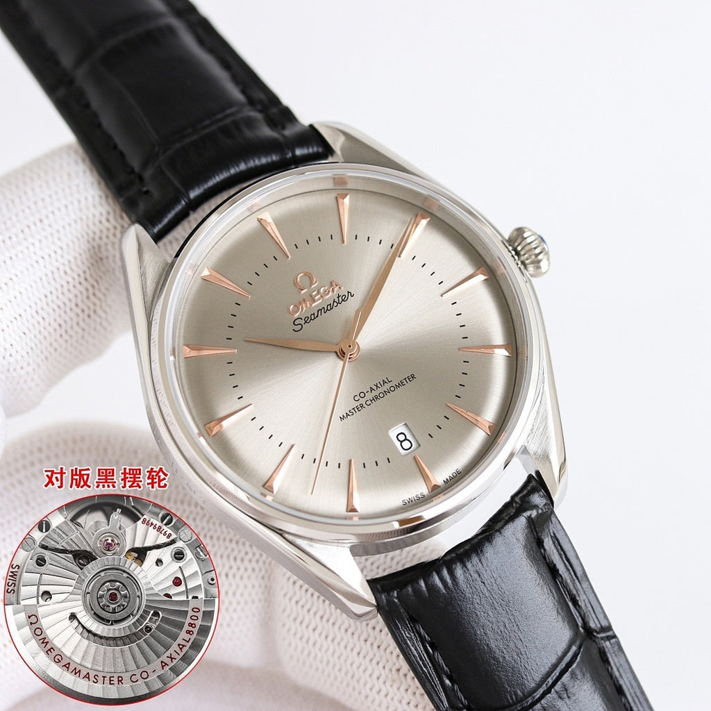 Omega Seamaster wristwatch close-up with champagne dial, rose-gold accents, black leather strap