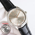Omega Seamaster wristwatch close-up with champagne dial, rose-gold accents, black leather strap