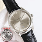 Omega Seamaster wristwatch with champagne dial, baton markers, and black leather strap