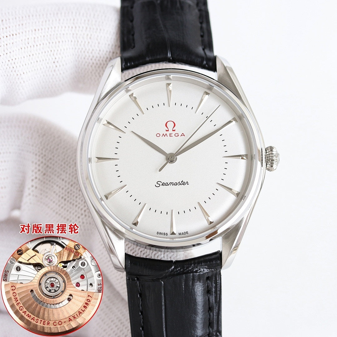 Steel Seamaster wristwatch with white dial and black leather strap, crown-side view