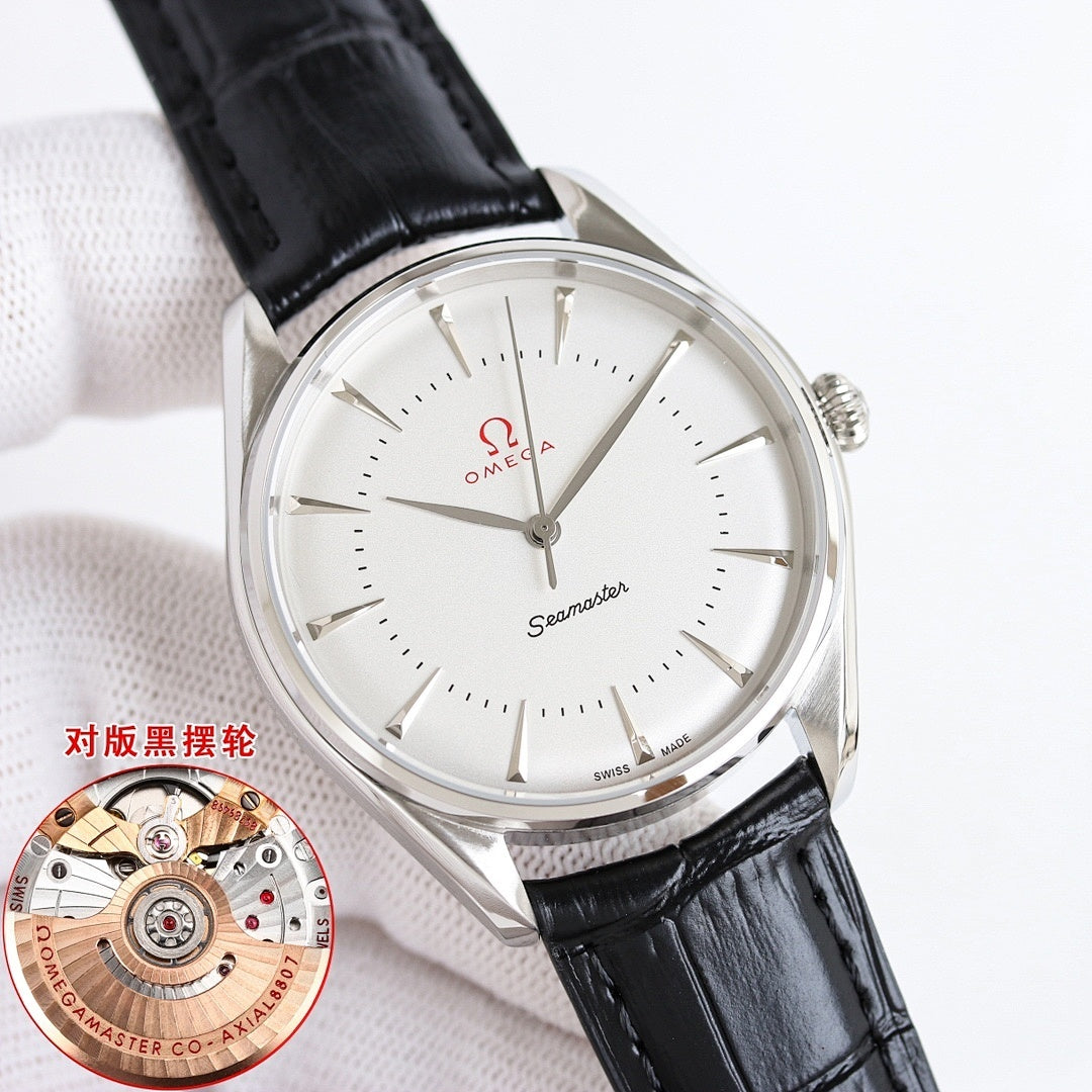 Steel Seamaster wristwatch with white dial and black leather strap, round bezel