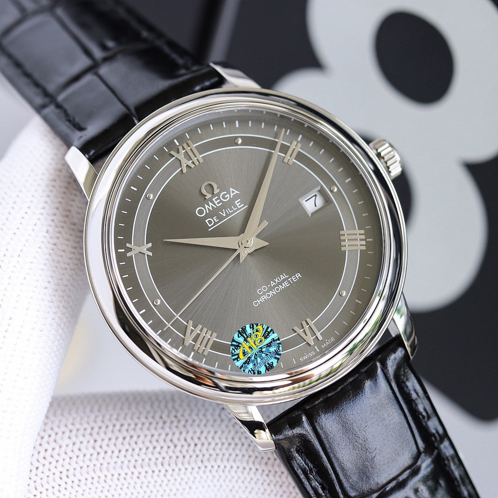 Omega watch with silver case, dark dial, Roman numerals, black leather strap