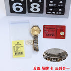 Omega wristwatch set with metal bracelet, watch accessories, and warranty card