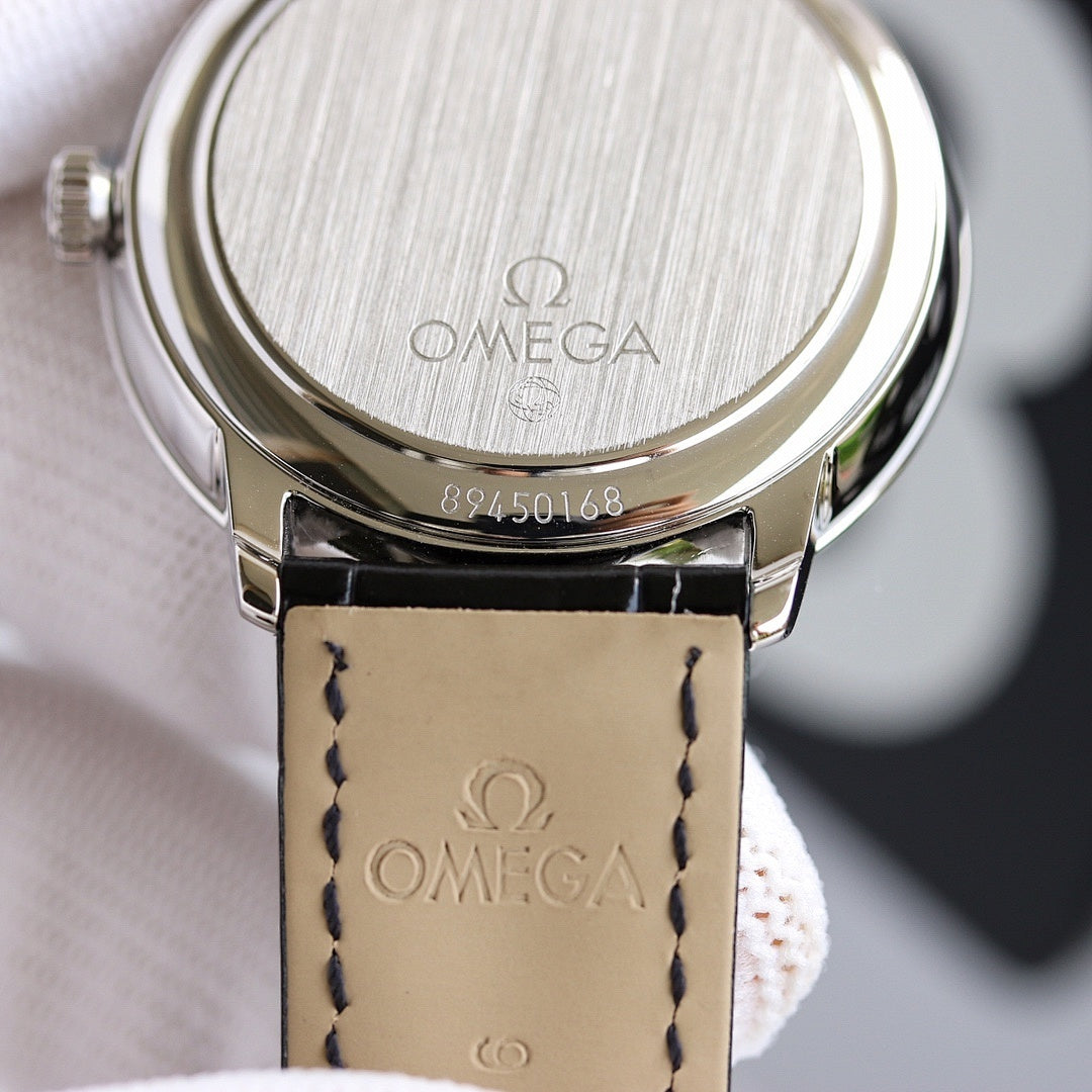 Wristwatch caseback with brushed metal finish and engraved markings