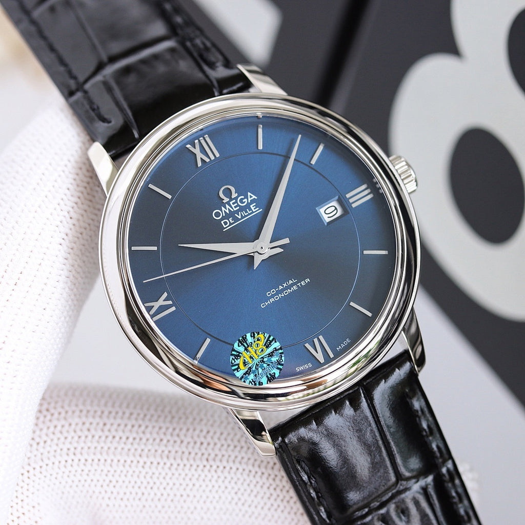 Wristwatch with blue dial, black leather strap, silver case and date window