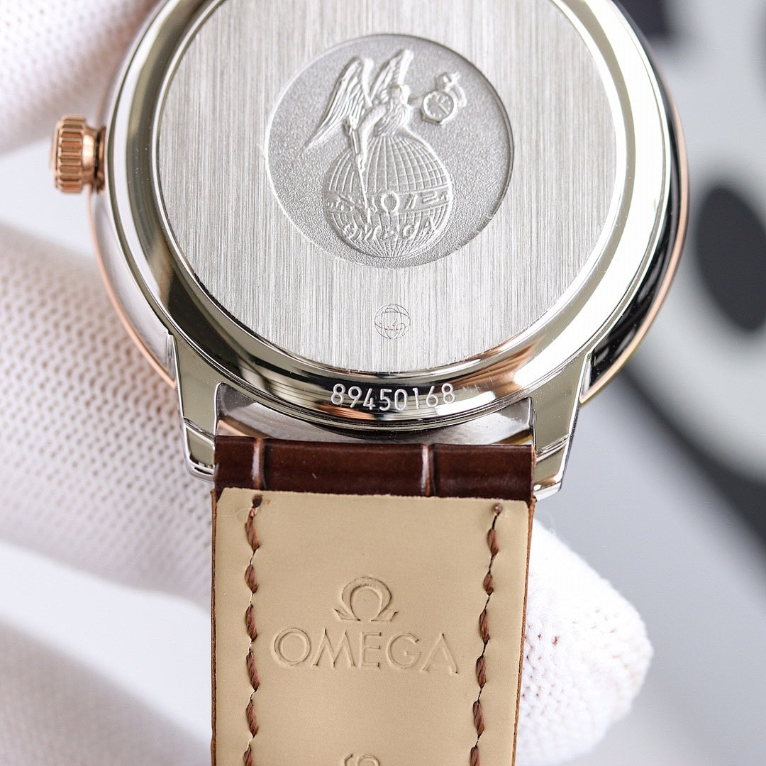Wristwatch case back with engraved emblem and brown leather strap