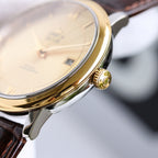Omega watch gold-tone case with crown and brown leather strap