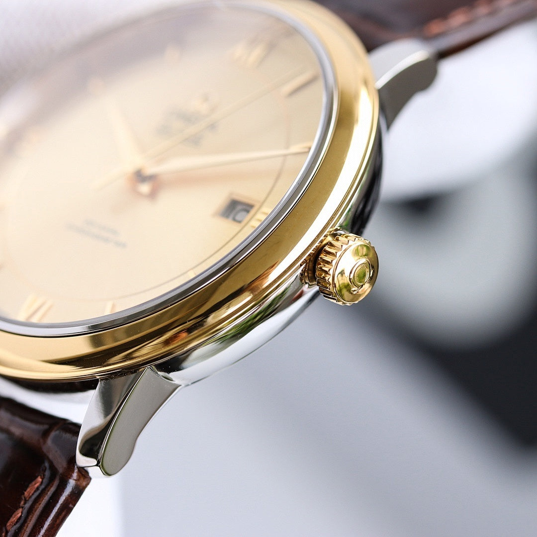 Omega watch gold-tone case with crown and brown leather strap