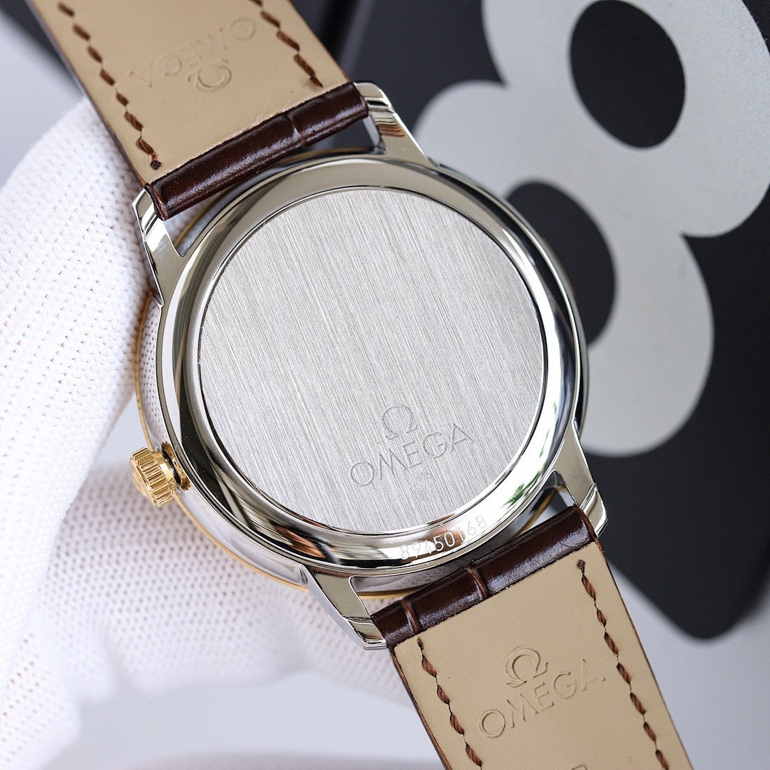 Omega watch caseback in brushed metal with brown leather strap