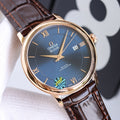 Omega watch with blue dial, gold case, brown leather strap and Roman numerals