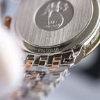 Stainless steel case back with engraved serial number and bracelet links