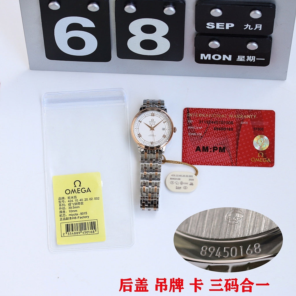 Omega wristwatch with metal bracelet, warranty card, and product tags