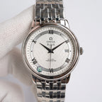 Omega De Ville watch front view with silver-tone metal bracelet and white dial, date window