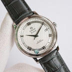 Omega De Ville watch with black leather strap, angled view of white dial and date window