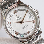 Omega wristwatch with textured white dial, rose-gold hands, date window, steel bracelet