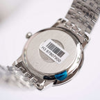 Omega De Ville case back with barcode label and engraved serial numbers