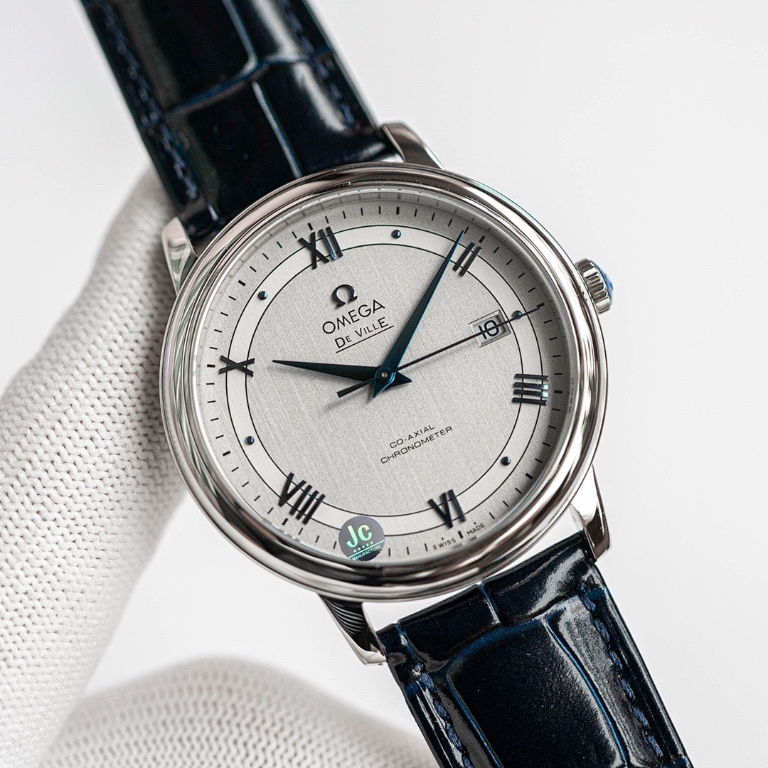 Omega De Ville wristwatch with blue leather strap and silver dial, Roman numerals